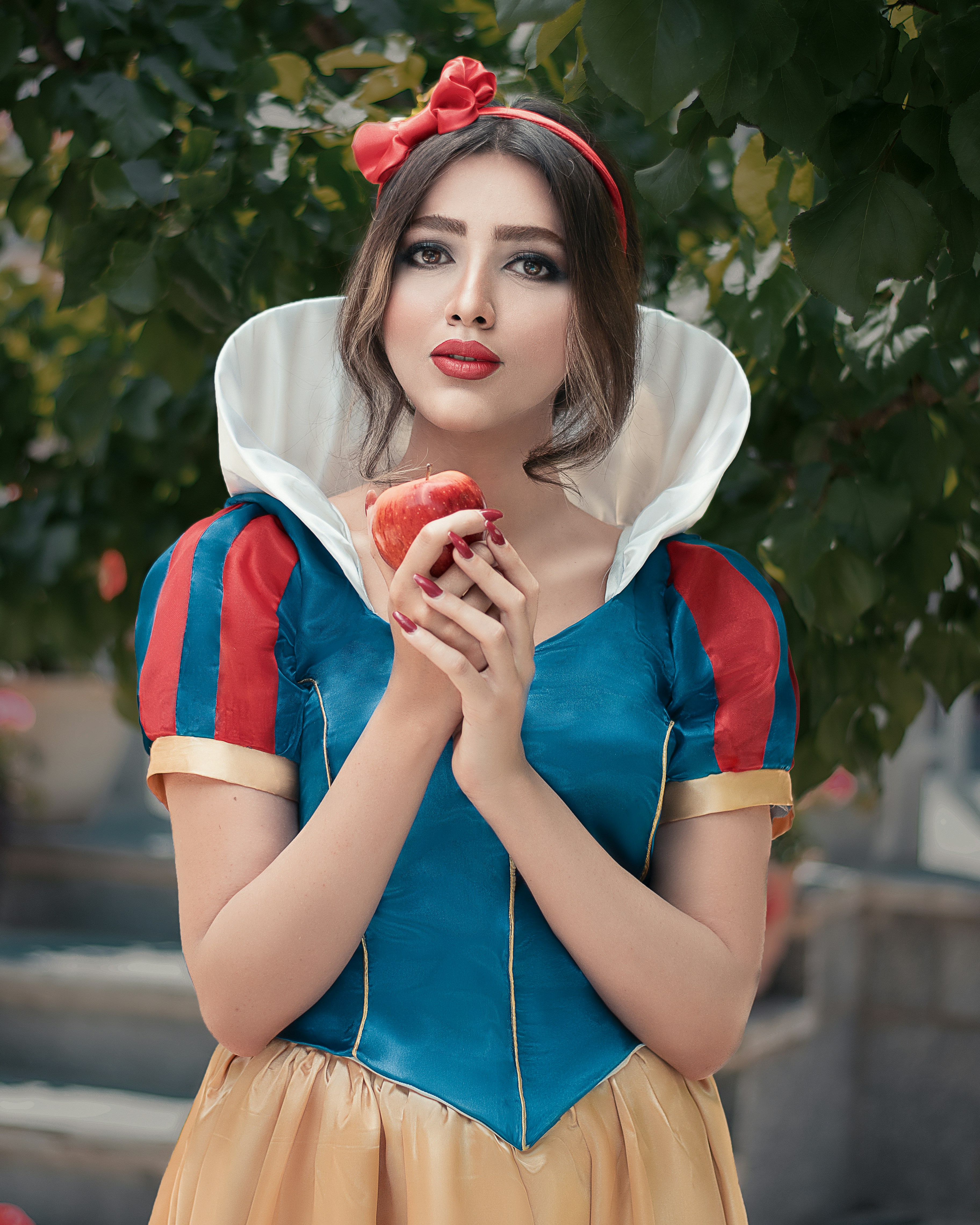a lady wearing a snow white costume