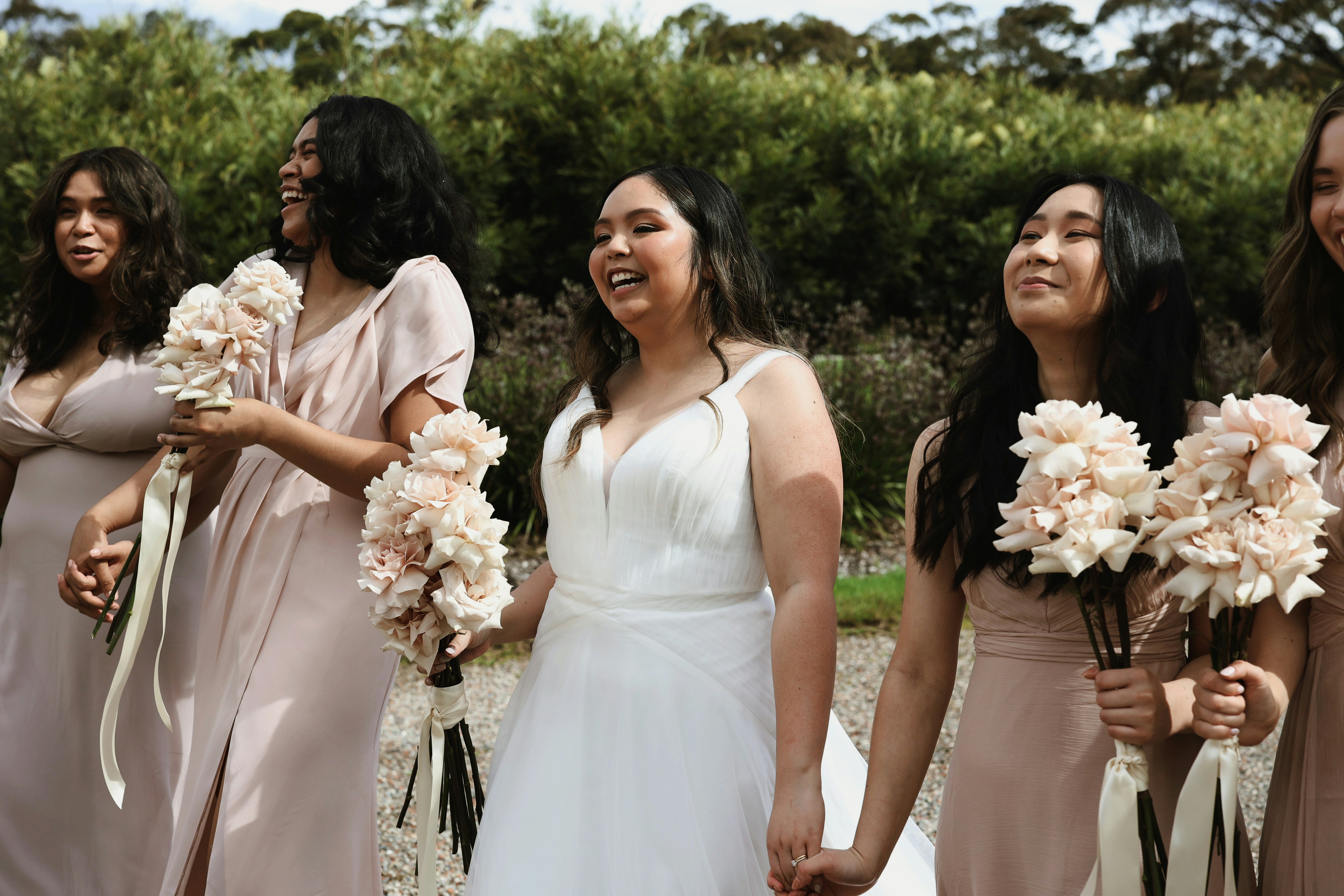 bridal party laughing